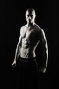 Fitness man on black background Royalty Free Stock Photo