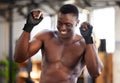 Fitness, man and dance for gym, success and body goal victory for training on blurred background. Happy, guy and dancing Royalty Free Stock Photo