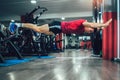 Fitness man doing extreme push ups in gym. Selective focus