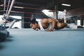 Fitness. Man Doing Push Ups On Boxing Ring. Handsome Asian Sportsman Training At Sports Center.