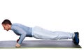 Fitness man doing push ups on mat Royalty Free Stock Photo