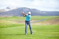 Fitness, man or golfer playing golf for fitness, workout or exercise with a swing on a green course. Wellness, person Royalty Free Stock Photo