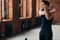 Fitness man with ideal body doing exercises at the Gym. Royalty Free Stock Photo