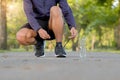 Fitness man legs walking in the park outdoor, male runner running on the road outside, asian athlete jogging and exercise on footp Royalty Free Stock Photo