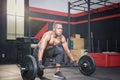 Fitness man lifting weights in gym fitness, Muscular man working out in gym doing exercises with barbell weight Royalty Free Stock Photo