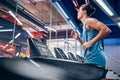 Fitness, man and running on treadmill for workout, exercise or cardio training for endurance at the gym. Active male Royalty Free Stock Photo