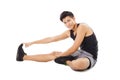 Fitness man sitting and making stretching Royalty Free Stock Photo