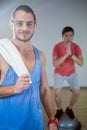Fitness man standing in gym Royalty Free Stock Photo