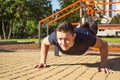 Fitness man training push up in the park Royalty Free Stock Photo