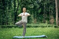 Fitness, man training yoga in tree pose Royalty Free Stock Photo