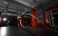 Fitness man working out with battle ropes at a gym Royalty Free Stock Photo