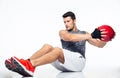 Fitness man working out with fitness ball Royalty Free Stock Photo