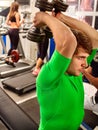 Fitness men friends in gym workout weights with equipment. Royalty Free Stock Photo