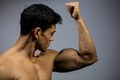 Fitness Model Flexing Bicep Muscle Royalty Free Stock Photo