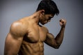 Fitness Model Flexing Bicep Muscle Royalty Free Stock Photo