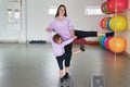 Fitness mother and child. Sports activities with children. Fitness center. Mom and baby gymnastics, yoga exercises. Health and Royalty Free Stock Photo