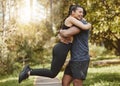 Fitness, nature and couple hug and spinning outdoors for exercise, training and running for cardio workout. Dating Royalty Free Stock Photo