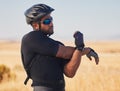 Fitness, nature and man cyclist stretching arms for race, marathon or competition training. Sports, cycling and male Royalty Free Stock Photo