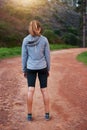 Fitness, nature and trail with runner woman outdoor from back for start of morning cardio workout. Exercise, forest or Royalty Free Stock Photo