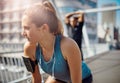 Fitness is not a destination, its a way of life. two sporty young people standing on a bridge during their workout. Royalty Free Stock Photo