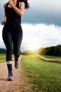 Fitness is not a destination, its a way of life. an unidentifiable young woman out for a run on a beautiful day. Royalty Free Stock Photo