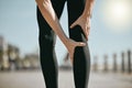 Fitness, pain and hands holding leg while running, exercise accident and knee problem while training. Injury, emergency