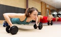 Fitness parners in sportswear doing exercises at gym. Fitness sport gym concept