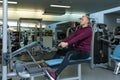 Fitness parners in sportswear doing exercises at gym. Fitness sport gym concept