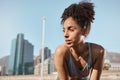 Fitness, runner and tired black woman in a city sweating from running exercise, cardio workout or training. Breathing Royalty Free Stock Photo