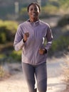 Fitness, running and black woman on mountain for exercise, marathon training and workout in nature. Sports, wellness and Royalty Free Stock Photo