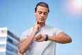 Fitness, running and pulse with man and watch check for training, heart rate and wellness app. Workout, exercise and