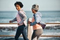 Fitness, running and senior women by ocean for healthy lifestyle, wellness and cardio on promenade. Sports, friends and