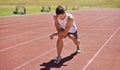 Fitness, running and stretching with athlete man getting ready on track for sports, race or competition. Exercise Royalty Free Stock Photo