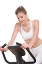 Fitness series - Sportive woman cycling Royalty Free Stock Photo