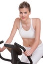 Fitness series - Woman on exercise bike Royalty Free Stock Photo