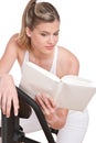 Fitness series - Woman reading book Royalty Free Stock Photo