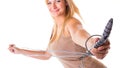 Happy blonde woman holding skipping rope Royalty Free Stock Photo