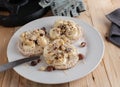 Fitness snack with brown rice cracker, almond butter, bananas and nuts on a plate Royalty Free Stock Photo