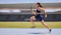 Fitness, speed and runner, woman running relay race with athlete and training on stadium track for sports and cardio Royalty Free Stock Photo
