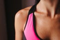 Sweaty muscular body of sporty woman, close up