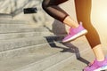 Fitness sport concept, young woman running up the stairs Royalty Free Stock Photo