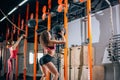 Two women throws medicine balls in fitness gym Royalty Free Stock Photo