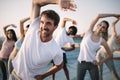 Fitness, sport, friendship and healthy lifestyle concept . Group of happy people exercising Royalty Free Stock Photo