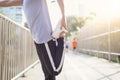 Fitness sport men fashion sportswear doing yoga fitness exercise in street. Fit young asian man doing training workout in morning. Royalty Free Stock Photo