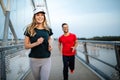 Fitness, sport, people, exercising and lifestyle concept. Couple running outdoor Royalty Free Stock Photo