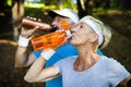 Fitness, sport, people, exercising and lifestyle concept - senior couple running Royalty Free Stock Photo