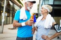 Fitness, sport, people, exercising and lifestyle concept - senior couple running Royalty Free Stock Photo