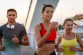 Fitness sport people running lifestyle concept. Group of young people jogging together outdoors. Royalty Free Stock Photo