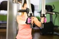 Fitness, sport, powerlifting and people concept - sporty woman doing workout in gym. Royalty Free Stock Photo