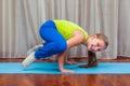 Fitness. sport, training and lifestyle concept - Child doing exercises on mat in home.